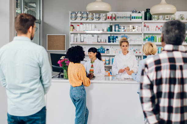 istock A queue of people standing in a pharmacy while shopping for medicine 1617209813