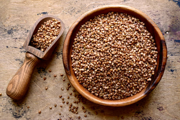 istock Raw organic buckwheat. Top view with copy space. 1617225769