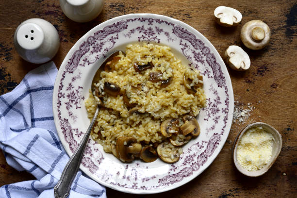 istock Risotto with mushrooms and cheese. Top view with copy space. 1617238587