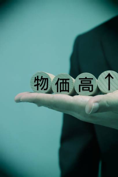 istock A person holding a building block written as high prices 1617245099