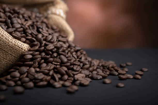 Coffee Beans with Copy Space Sack of coffee beans with space for your text roasted coffee bean stock pictures, royalty-free photos & images