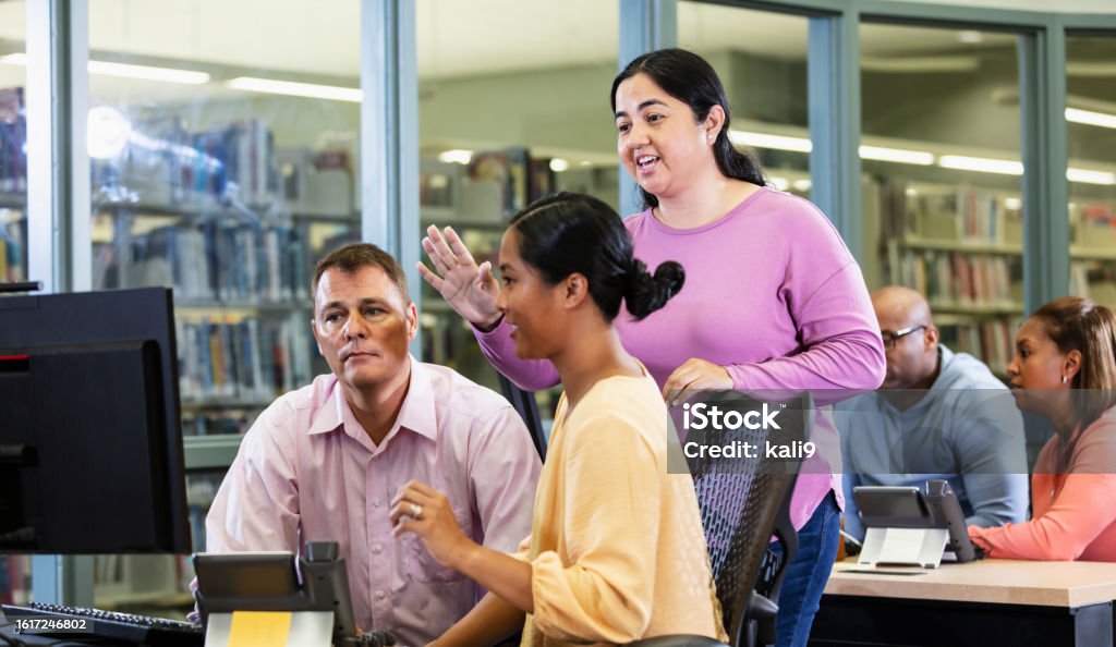 Adult Student Using Computer Adults In Continuing Education Class Using Computers Stock Photo ...
