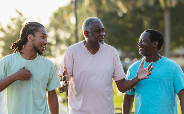 istock Multi-generation African-American family walking, talking 1617249467
