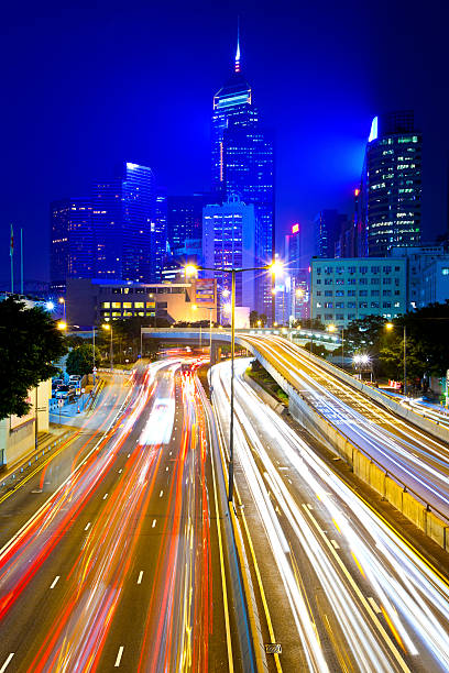 istock Busy traffic at night in Hong Kong 161725652