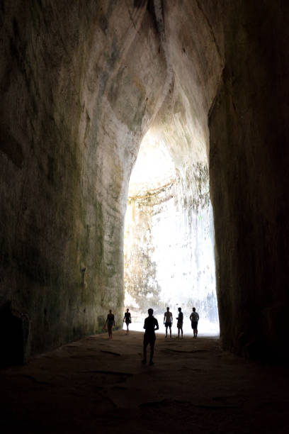 istock People Exploring the Ear of Dionysus Cavern 1617257978