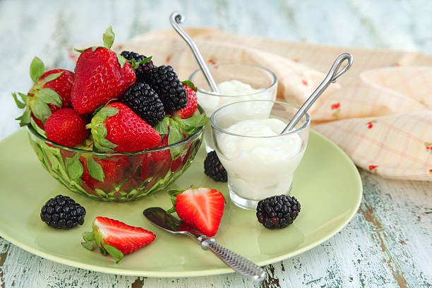 istock Yogurt with fresh berries in small glass cup 161725870