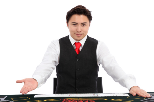 Black jack dealer with cards, wearing a vest and red tie. White background.