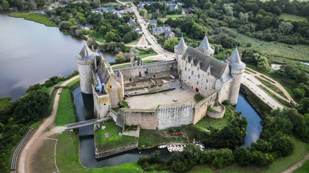 Sarzeau, Morbihan, France - 12th August 2023: Drone point of view still image of Château de Suscinio or de Susinio, the residence of the Dukes of Brittany built in the late Middle ages.