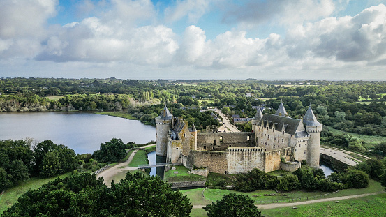 Sarzeau, Morbihan, France - 12th August 2023: Drone point of view still image of Château de Suscinio or de Susinio, the residence of the Dukes of Brittany built in the late Middle ages.