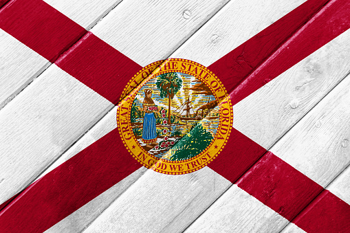 Florida state flag on white board