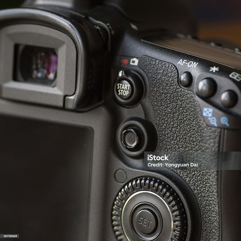 Using a DSLR Using a DSLR.  Arranging Stock Photo