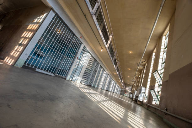 istock looking down the hallway of a prison with a tilted perspective 1617311649