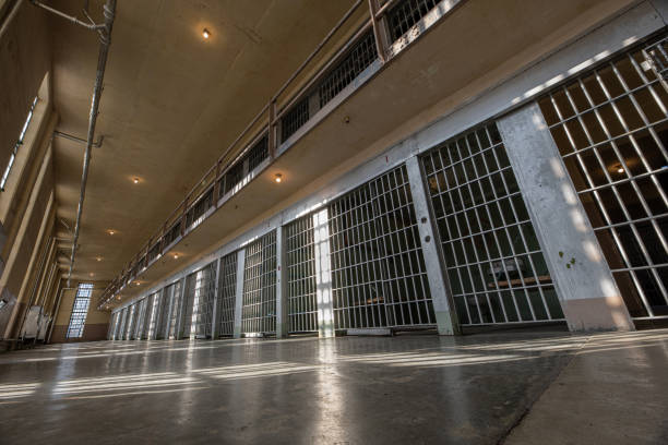 istock Wide angle view of jail cells 1617312181