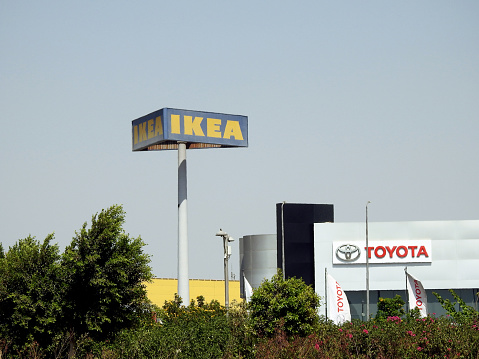 Cairo, Egypt, July 21 2023: IKEA and Toyota, IKEA is a Swedish Dutch multinational conglomerate that designs and sells furniture, Toyota is a Japanese multinational automotive manufacturer, selective focus