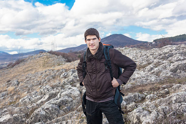 Hiker on mountain stock photo