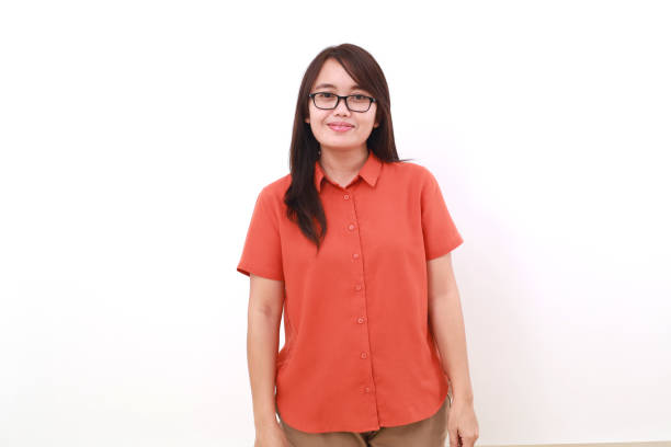 istock Beautiful young asian woman standing while looking at the camera. Isolated on white 1617444882