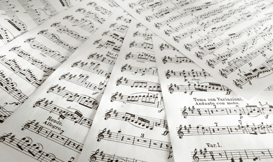 Details of music scores printed on papers.