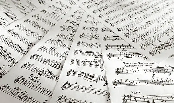 Details of music scores printed on papers.