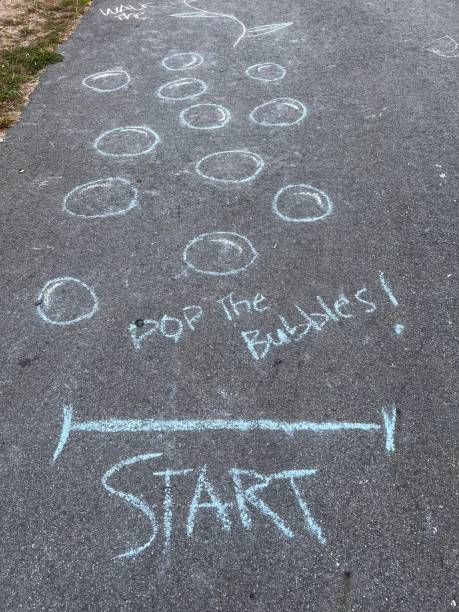 istock Children sidewalk Chalk Art 1617483457