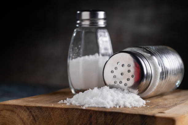 istock Glass salt shaker on the table. 1617515079