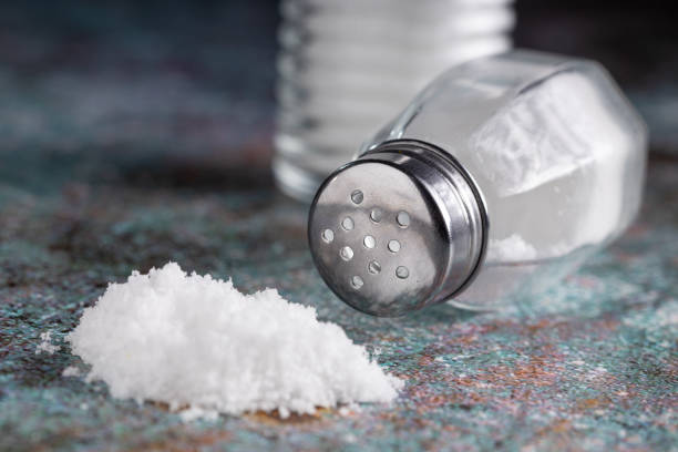istock Glass salt shaker on the table. 1617516684