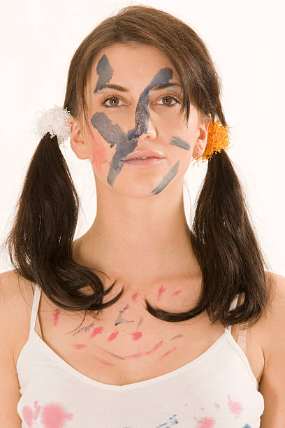 istock Young woman with paint on his face 161752234