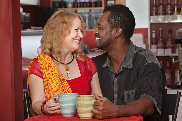 istock Smiling Mixed Couple in Cafe 161757819