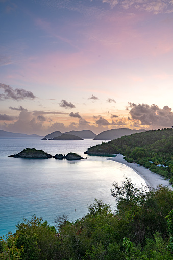 Vibrant sunrise over famous Trunk Bay on the tropical Caribbean island of St. John in the US Virgin Islands