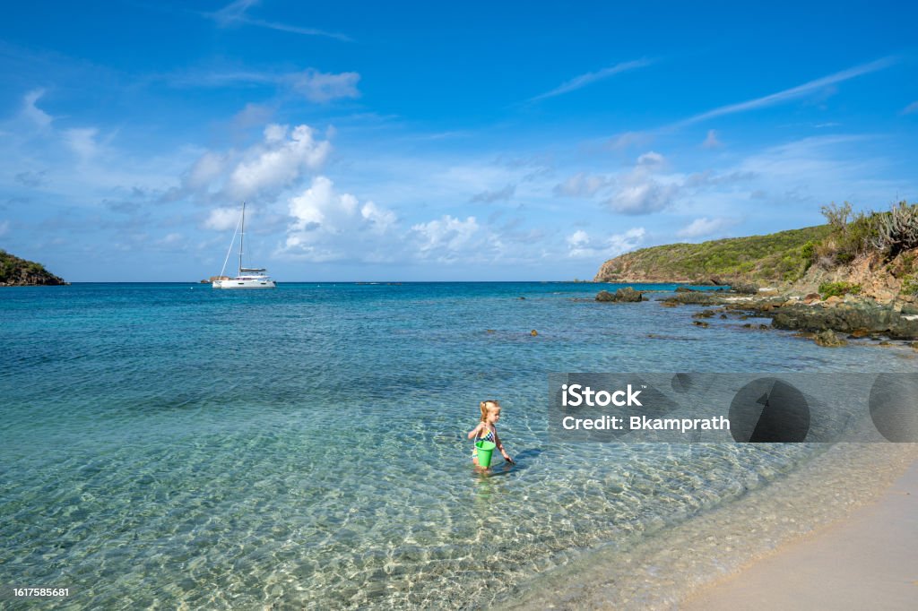Child Playing on the Beautiful Secluded Salt Pond Beach on the Tropical Caribbean Island of St. John in the US Virgin Islands Child playing on the beautiful secluded Salt Pond Beach on the tropical Caribbean island of St. John in the US Virgin Islands 4-5 Years Stock Photo