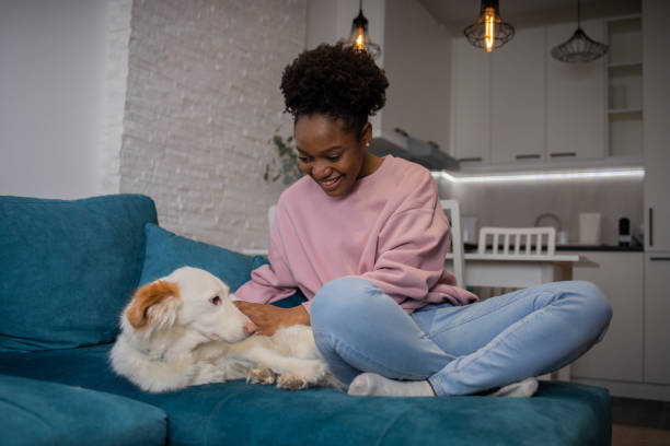 istock Happy young woman using phone 1617588855