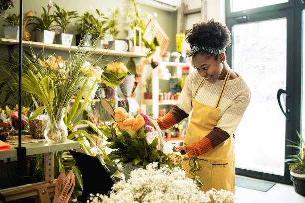 istock Young female florist 1617590447