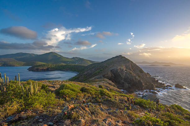 Vibrant Sunrise from Ram Head Peak Overlooking the Beautiful Secluded Salt Pond Beach on the Tropical Caribbean Island of St. John in the US Virgin Islands stock photo