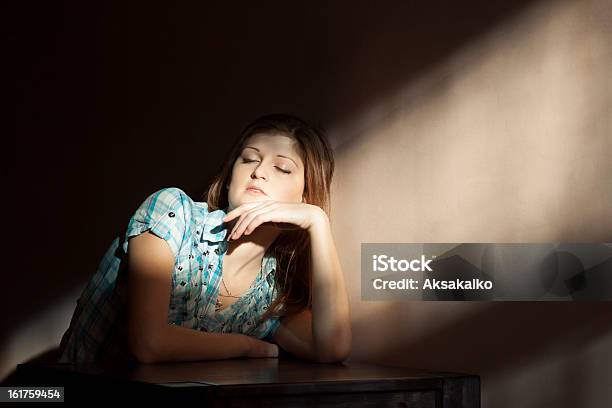 Sag Girl Sitting Alone Stock Photo - Download Image Now - Adult, Adults Only, Beautiful People