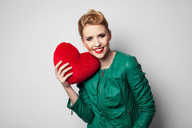 istock Woman holding heart 161760315
