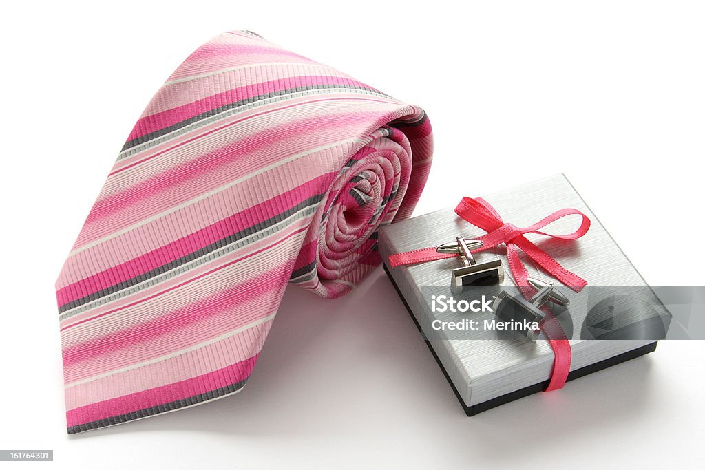 Tie with cuff links and gift box Tie with cuff links and gift box on white background Anniversary Stock Photo