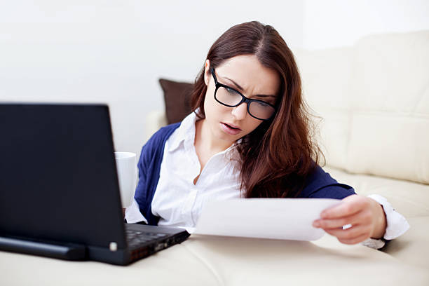 istock Busy young woman working at home 161767283