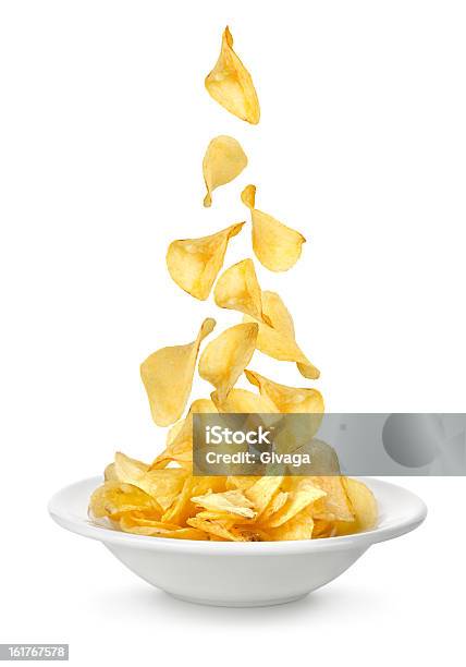 Kartoffelchips Fallen In Der Teller Stockfoto und mehr Bilder von Kartoffelchips - Kartoffelchips, Fallen, Kartoffelgericht