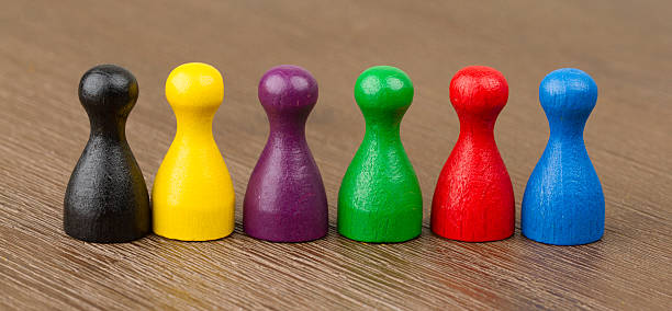 istock Different colours of pawns 161769125