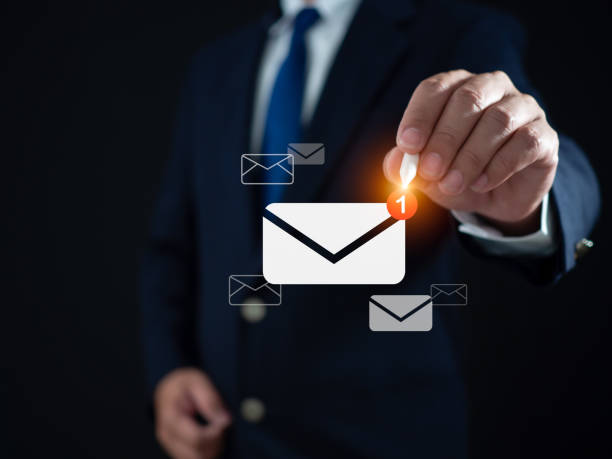 istock HBusinessman using pen to touch email on virtual screen. New email notification concept for business email communication and digital marketing. Inbox receives notification of electronic messages. Internet technology. 1617745307