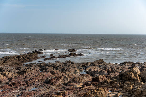 istock On a clear day, the reefs and waves by the seaside 1617819492