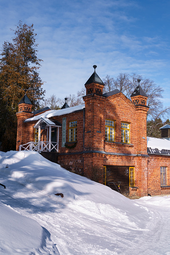 Information building at the Verla Groundwood and Board Mill in winter, the world heritage site in Kouvola, Finland. March 6, 2023.