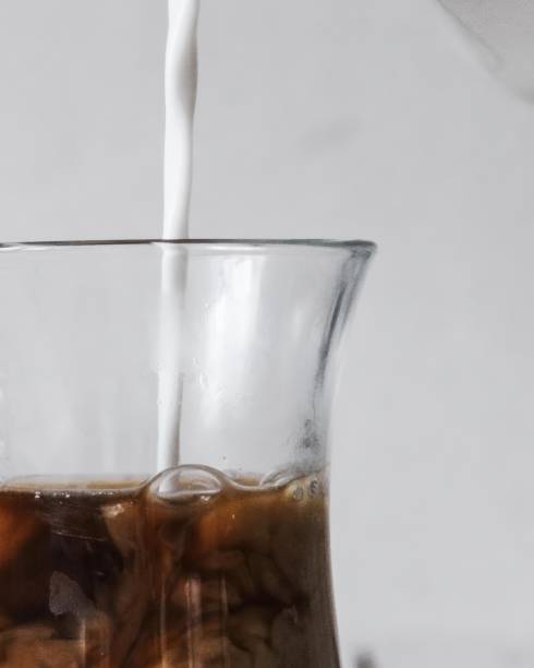 istock cold coffee with latte type milk, with ice cold refreshing drink 1617860217