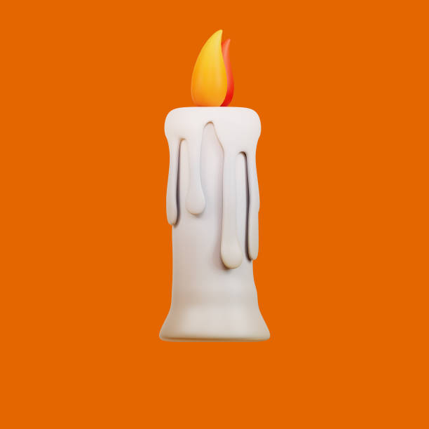 istock Candles halloween on orange background 1617861254