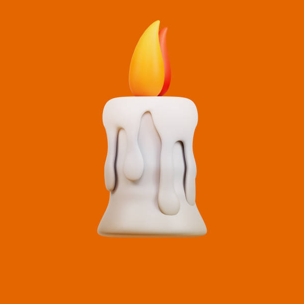istock Candles halloween on orange background 1617861257