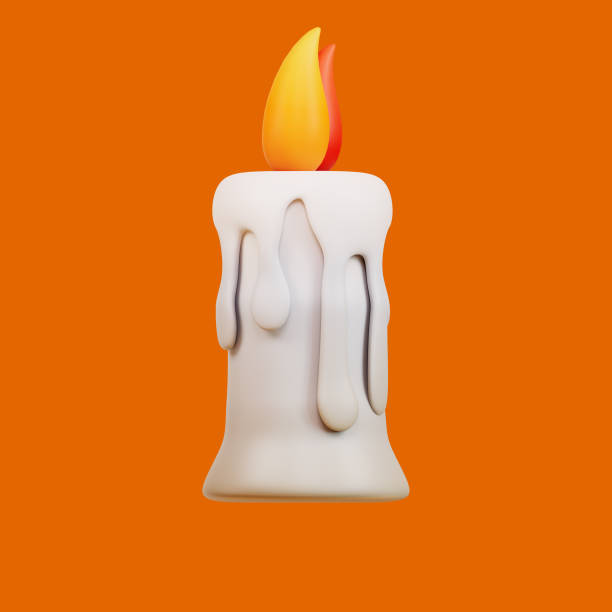 istock Candles halloween on orange background 1617861263