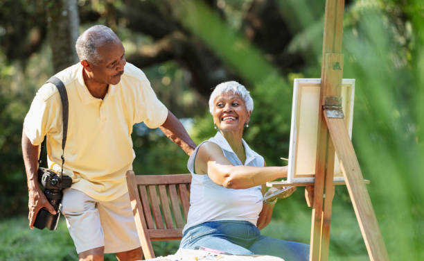 istock Senior African-American couple pursuing hobbies 1617864981