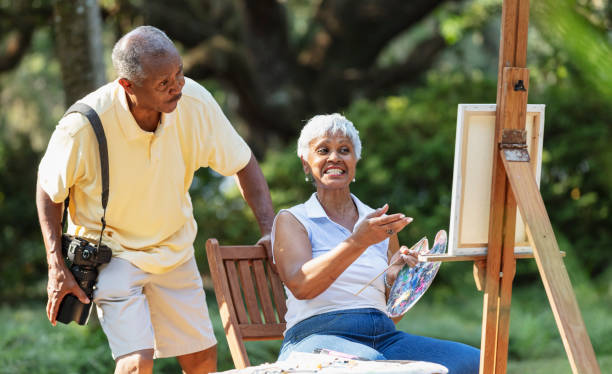 istock Senior African-American couple pursuing hobbies 1617864994