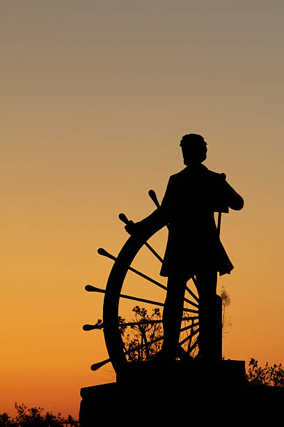 Samuel Clemens (Mark Twain) at the Wheel