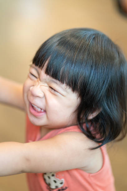 istock Cute little girl in cutety action. 1617893572