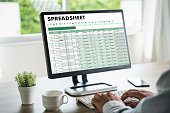 businessman working with data and graphs in spreadsheet documents for online analysis Microsoft Excel project dashboard accounting digital